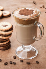 Unusual dalgon coffee in a transparent glass for breakfast