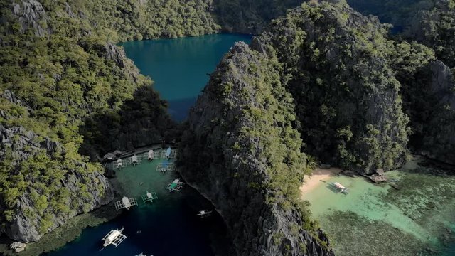 Aerial view of turquoise tropical lagoon with Karst limestone cliffs in Coron Island, Palawan, Philippines. UNESCO World Heritage Tentative List, Baracuda Lake