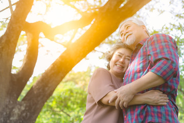 Happiness Grandparents asian couple. Grandfather and grandmother embracing each other with love and...