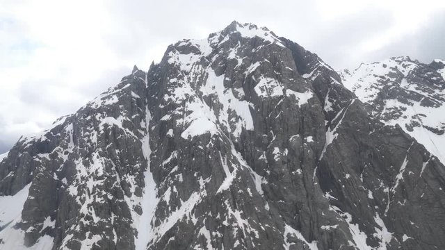drone shot showing the snow mountain in full.mov