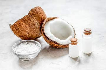 organic cosmetics with coconut on white background