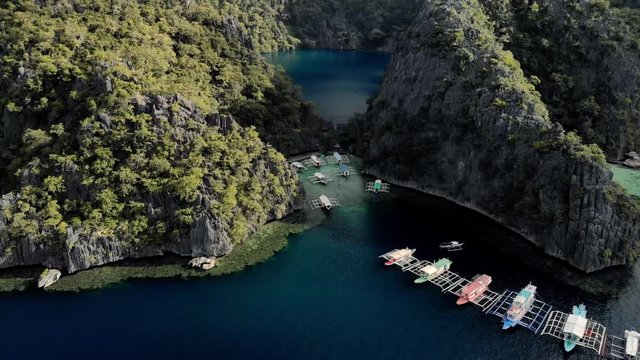 Aerial view of turquoise tropical lagoon with Karst limestone cliffs in Coron Island, Palawan, Philippines. UNESCO World Heritage Tentative List, Baracuda Lake