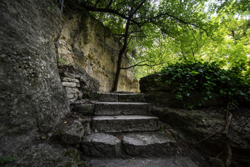 Old path way between trees in the forest near Madara, Bulgaria. Beautiful spring landscape