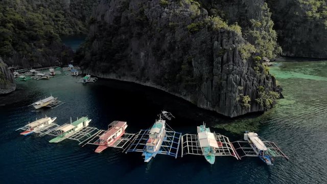 Aerial view of turquoise tropical lagoon with Karst limestone cliffs in Coron Island, Palawan, Philippines. UNESCO World Heritage Tentative List, Baracuda Lake
