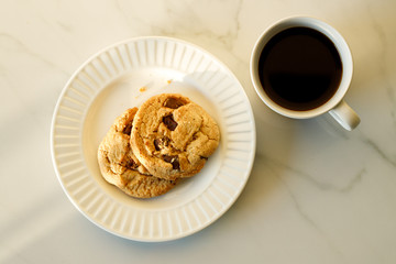cups of coffees on white marble table in morning light