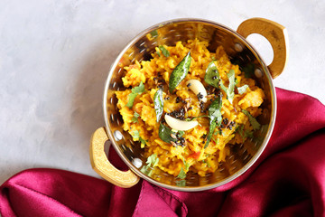 Dal khichadi/Masala Khichdi/daal khichdi tadka is a healthy Indian recipe made of mixed Lentils & rice combined with spices & vegetables. Served with Curd or Yogurt, Papad & chili pickle. Copy Space