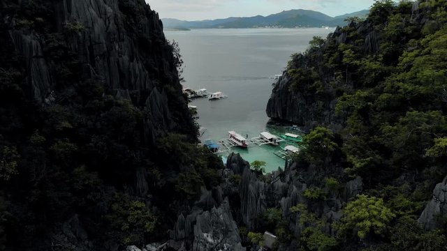 Aerial view of turquoise tropical lagoon with Karst limestone cliffs in Coron Island, Palawan, Philippines. UNESCO World Heritage Tentative List, Baracuda Lake