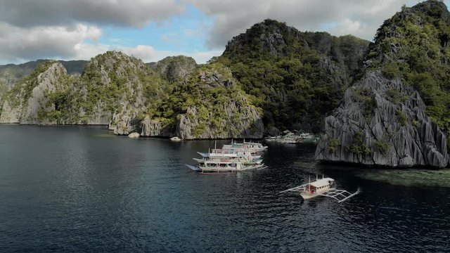 Aerial view of turquoise tropical lagoon with Karst limestone cliffs in Coron Island, Palawan, Philippines. UNESCO World Heritage Tentative List, Baracuda Lake