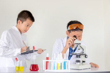 Children science concept, Portrait of teenager students educate in laboratory or classroom about chemical solution