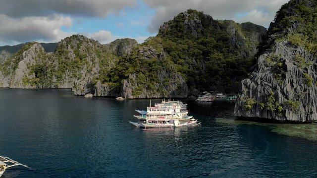 Aerial view of turquoise tropical lagoon with Karst limestone cliffs in Coron Island, Palawan, Philippines. UNESCO World Heritage Tentative List, Baracuda Lake