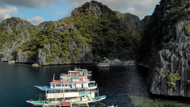 Aerial view of turquoise tropical lagoon with Karst limestone cliffs in Coron Island, Palawan, Philippines. UNESCO World Heritage Tentative List, Baracuda Lake