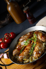 Homemade white sausage fried with onion and herbs