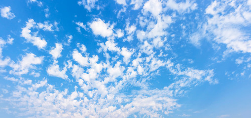 White dust clouds in blue sky with day light
