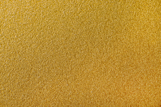 gold painted metal surface for background