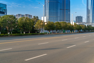 Fototapeta na wymiar Empty urban road and buildings in China