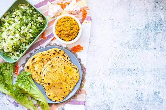 Vegan healthy food lunch. Corn flat bread, lentil and vegetables salad. Balanced meal. Flat lay.