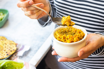 Indian lentil dal with spices and herbs. Vegan food lunch
