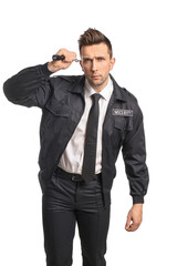 Male security guard with flashlight on white background