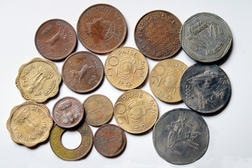 Indian Old vintage coins. Indian old and new coins isolated on white background.  Valid and invalid Indian currencies.