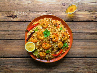 Biryani with shrimp. Tasty and delicious prawns biryani, top view