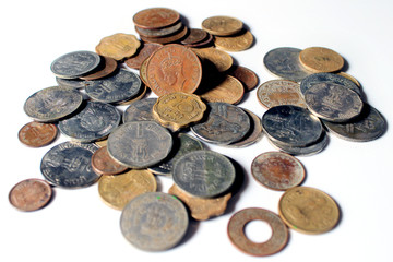 Indian Old vintage coins. Indian old and new coins isolated on white background.  Valid and invalid Indian currencies. Old Indian Currency old Coin - GEORGE VI KING EMPEROR picture highlighted.