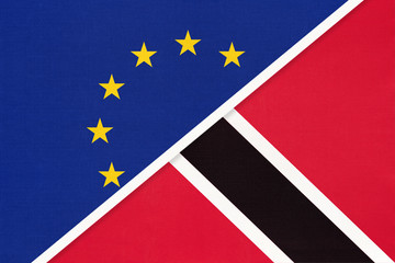 European Union or EU vs Trinidad and Tobago national flag from textile. Symbol of the Council of Europe association.