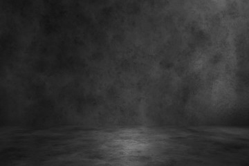 Black concrete background wall. Old surfaces that have scratches and cracks. Black room.