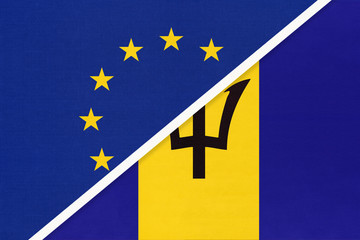 European Union or EU vs Barbados national flag from textile. Symbol of the Council of Europe association.