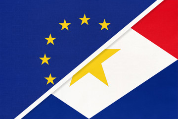 European Union or EU vs Saba island national flag from textile. Symbol of the Council of Europe association.