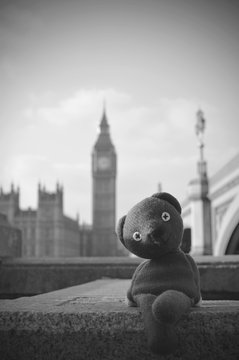 Stuffed Toy On Retaining Wall Against Big Ben