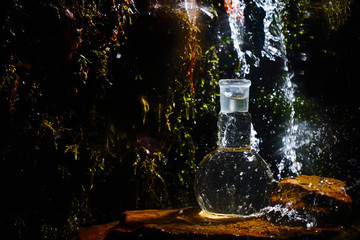 Glass flask with clear water.
