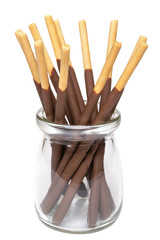 Chocolate cream covered biscuit sticks in a glass jar