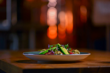 Avocado salad with lemon and fresh sunflower seeds and sprouts. Lenten meal. Fresh organic vegetables.