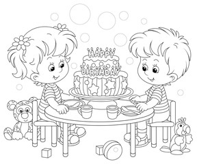 Happy little kids friendly smiling and sitting round their festive board with a fancy birthday cake decorated with letters candles, black and white vector cartoon illustration for a coloring book page