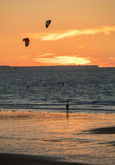  Sunset and Kitesurfers on the beach in Saint Malo,  Brittany, France