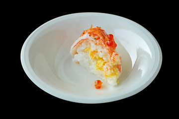 A piece of Salmon cake on white round plate.