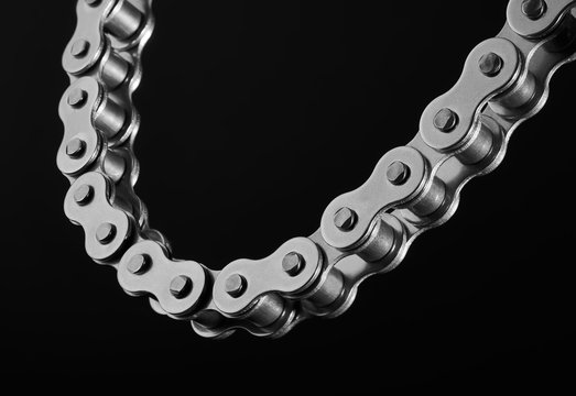 roller chain on a black background