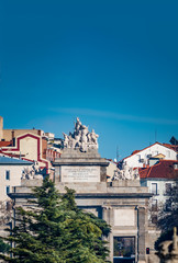 Fototapeta na wymiar Historic Toledo gate entrance to Madrid under blue sky