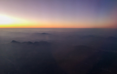 Sunset over the mountains of planet Earth.