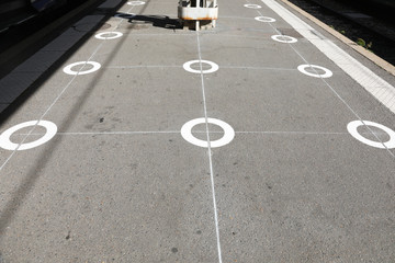 circle on cement ground floor of a walkway