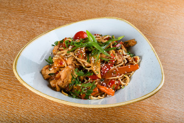 Noodles with chicken, soy and oyster sauce, sesame oil, ginger, garlic, fresh coriander leaves.
