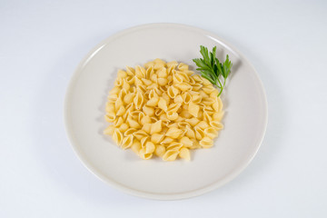 plate of pasta on white background