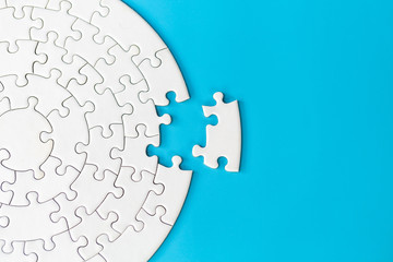 Jigsaw puzzle with missing piece. Completing final task, missing jigsaw puzzle pieces and business concept with a puzzle piece missing. - obrazy, fototapety, plakaty