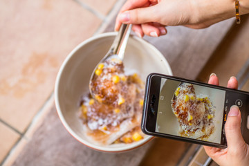 A blurry abstract background of a healthy dessert menu (sago from natural trees), bring to heat and add coconut milk, corn together, moderately sweet taste