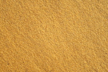Fototapeta na wymiar Top view of beautiful seamless sands texture background on clean beach