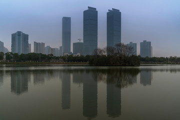 Obraz na płótnie Canvas Lakeside modern office building in China