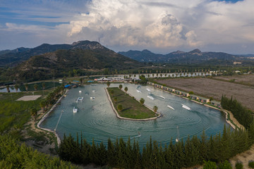 Fototapeta premium Aerial drone view Hip-notics cable park wake park in Antalya Turkey. Wakeboarding in Turkey.