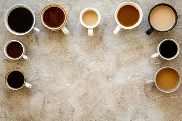 Flay lay with cups - coffee break - on beige background top view copy space