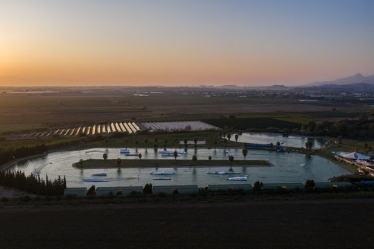 Aerial drone view sunset in Hip-notics cable park wake park in Antalya Turkey. Wakeboarding in Turkey.