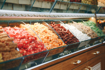 Sale of various dried fruits at the local market in Turkey. Or a store counter with dried fruits